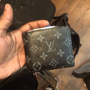 LV black monogram wallet.